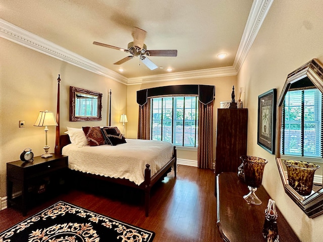 bedroom featuring ceiling fan, ornamental molding, and wood-type flooring