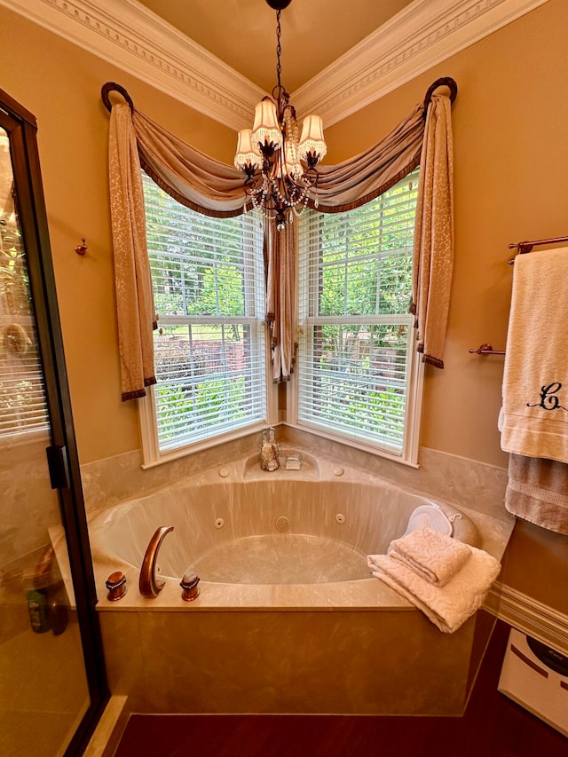 bathroom featuring a notable chandelier and crown molding