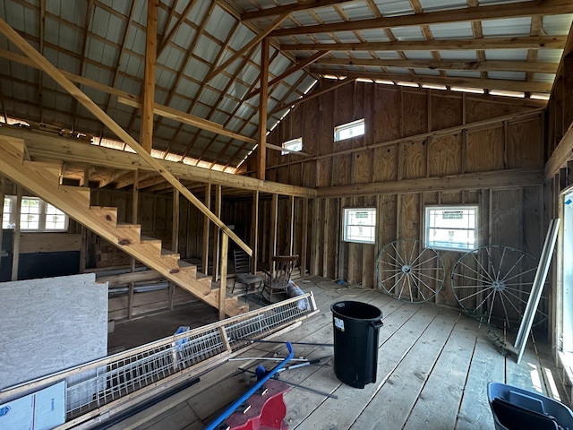 misc room with high vaulted ceiling