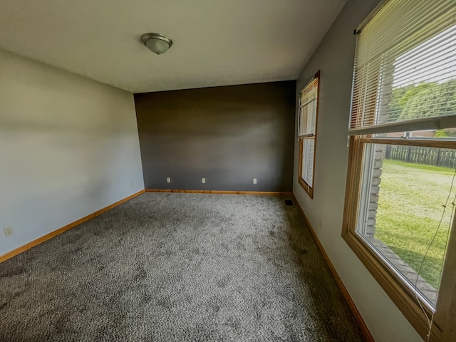 empty room featuring carpet floors