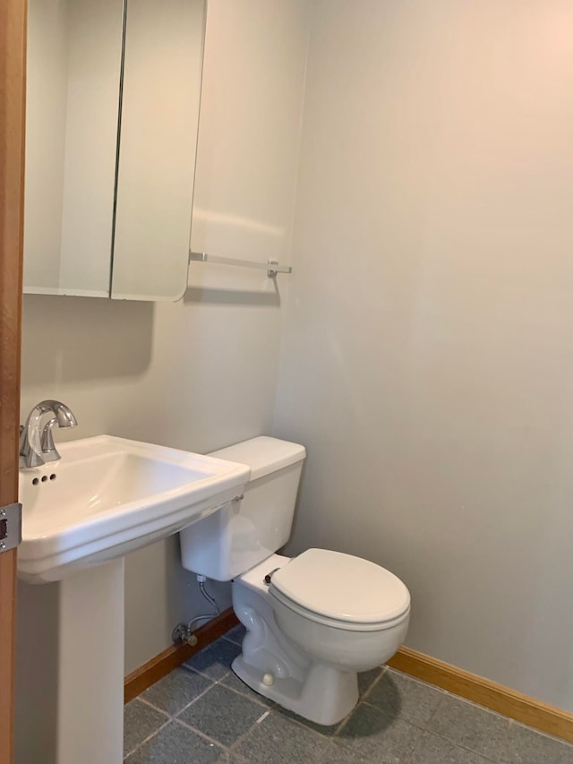 bathroom featuring toilet