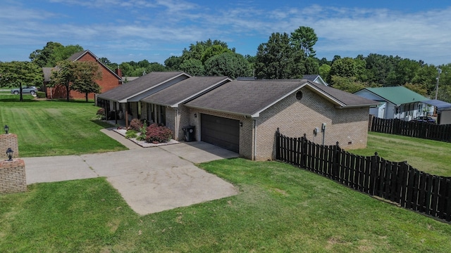 exterior space featuring a yard and a garage