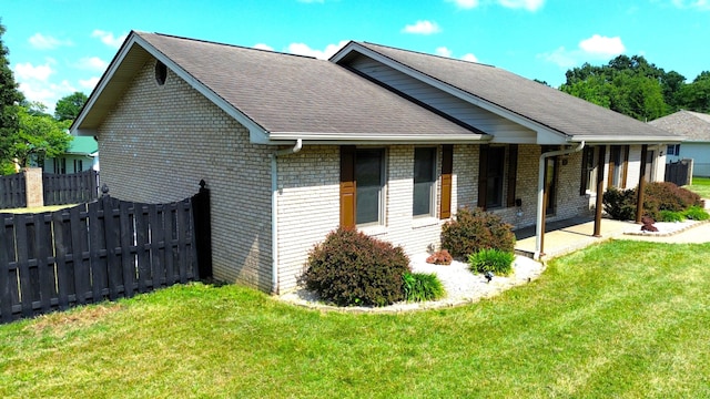 exterior space with a front lawn