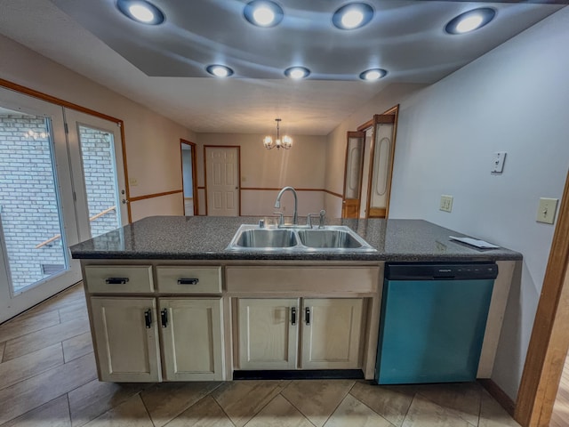 kitchen with dishwasher, cream cabinets, a notable chandelier, hanging light fixtures, and sink