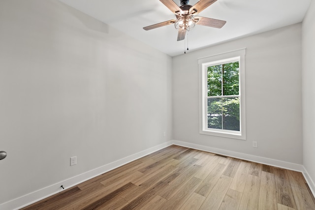 unfurnished room with light hardwood / wood-style flooring and ceiling fan