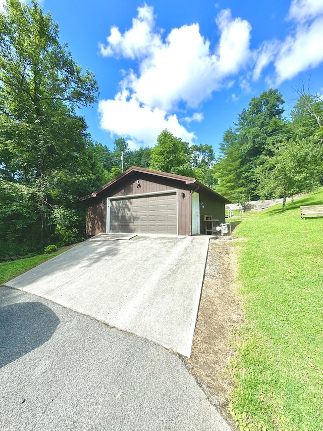 garage with a lawn