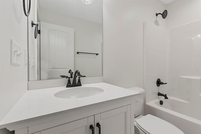 full bath featuring shower / bath combination, vanity, and toilet