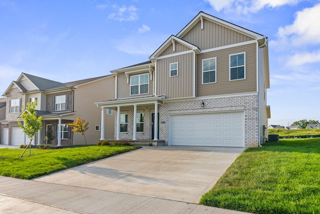 view of front of house with cooling unit, a front yard, and a garage