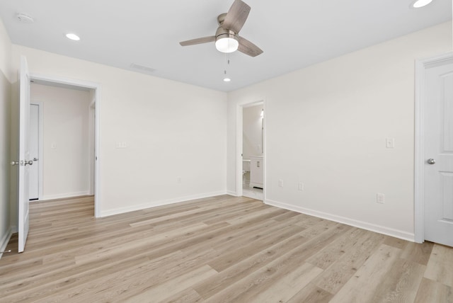 spare room with ceiling fan and light hardwood / wood-style flooring