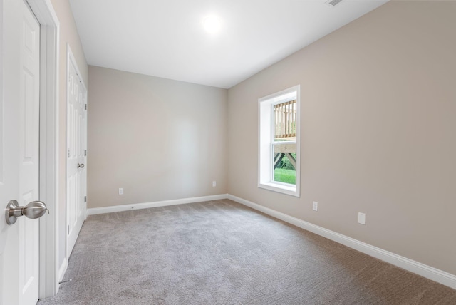 view of carpeted spare room