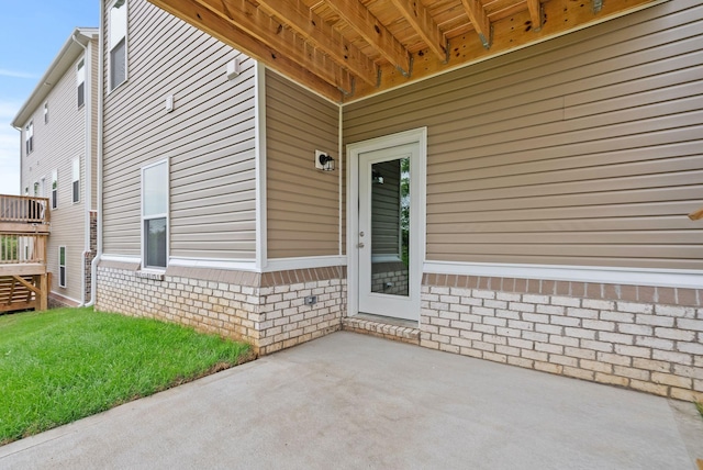 doorway to property featuring a patio