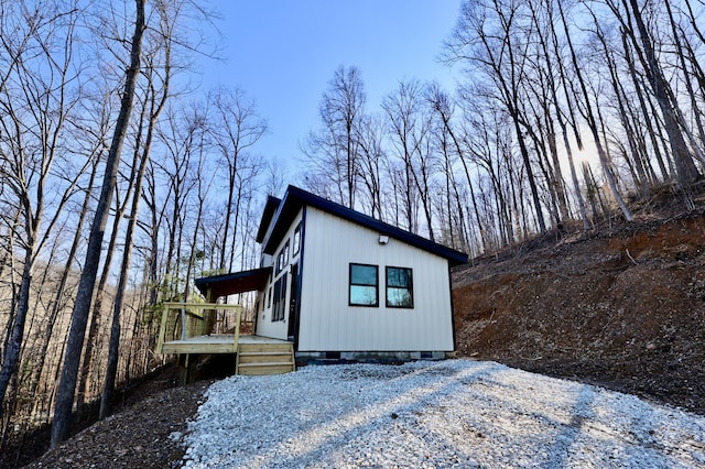 view of side of home with crawl space