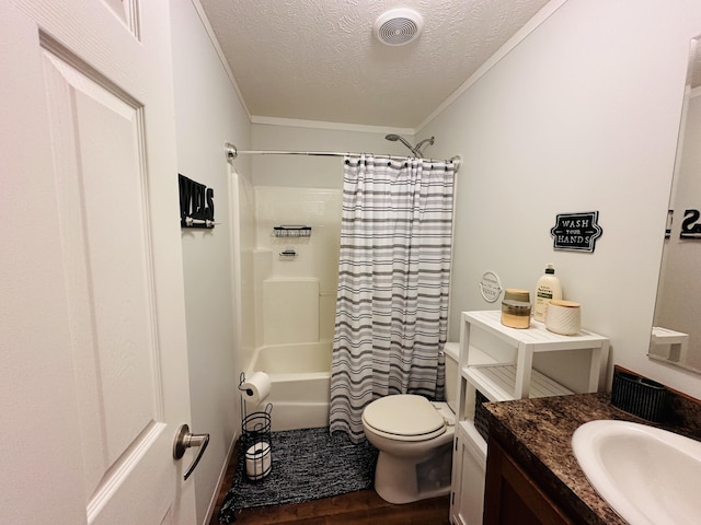 full bathroom with ornamental molding, vanity, a textured ceiling, wood-type flooring, and toilet