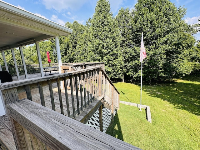 deck featuring a yard