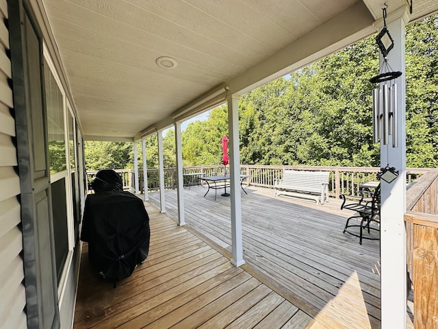 wooden terrace with grilling area