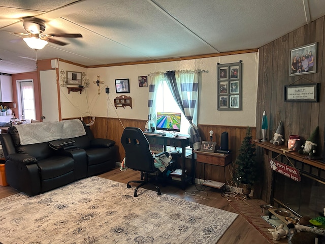 office featuring ceiling fan, a textured ceiling, and hardwood / wood-style flooring