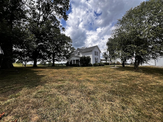 exterior space with a front lawn