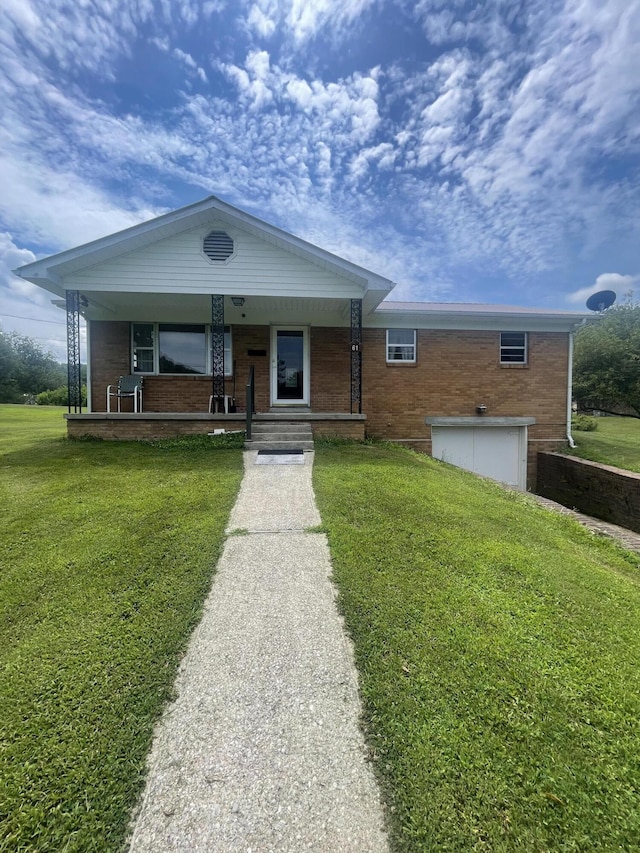 view of front of home featuring a porch and a front lawn