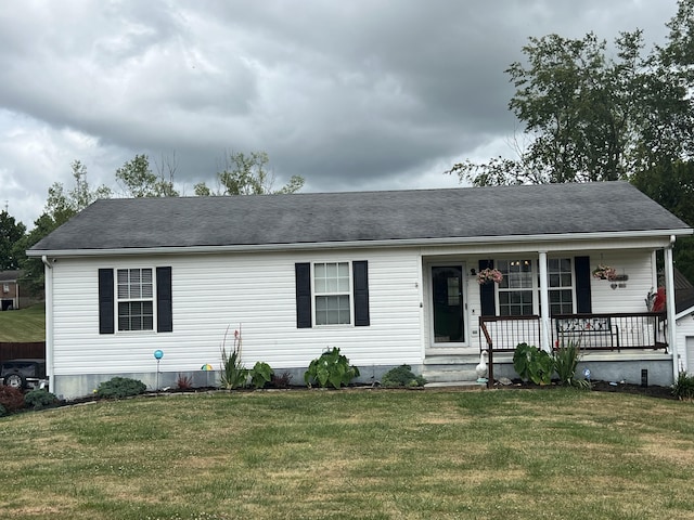 view of front of property featuring a front lawn and covered porch