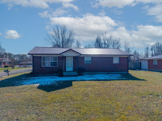 single story home with a front lawn