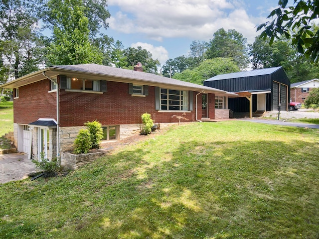 ranch-style home featuring a garage and a front lawn