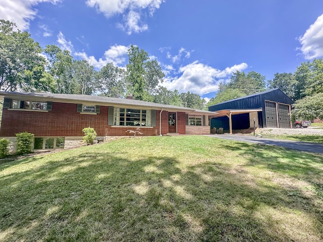 ranch-style house with a garage and a front yard