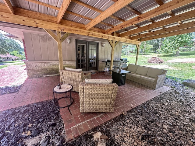 view of patio featuring a grill and outdoor lounge area