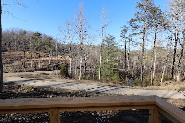 exterior space with a view of trees