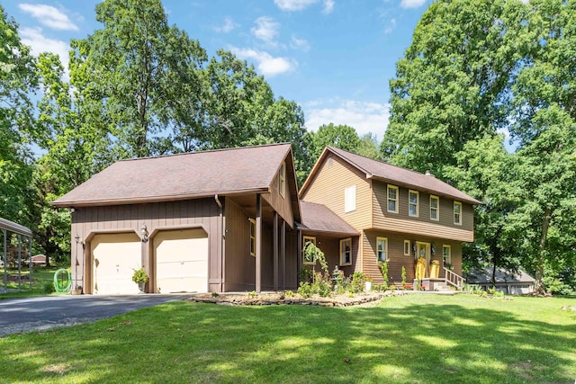 view of front facade featuring a garage and a front yard