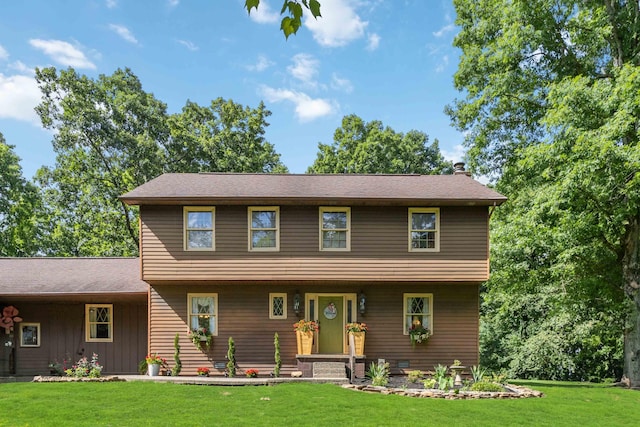 view of front of property with a front yard