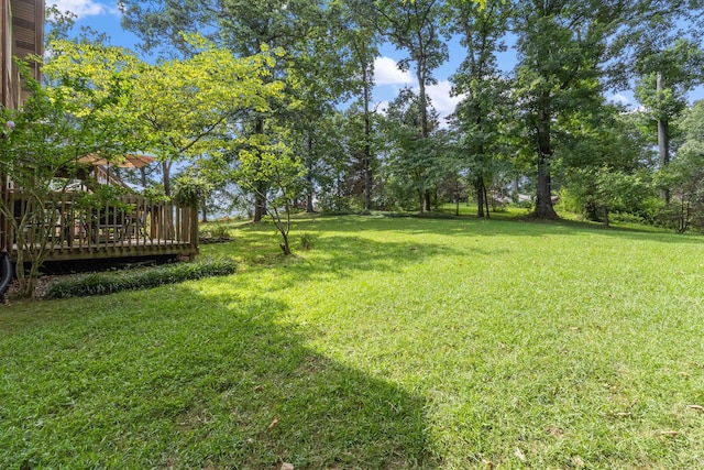 view of yard with a deck