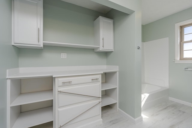 bathroom featuring a tub