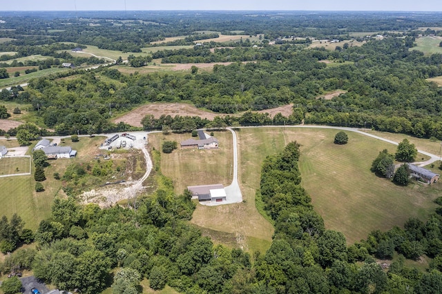 birds eye view of property featuring a rural view