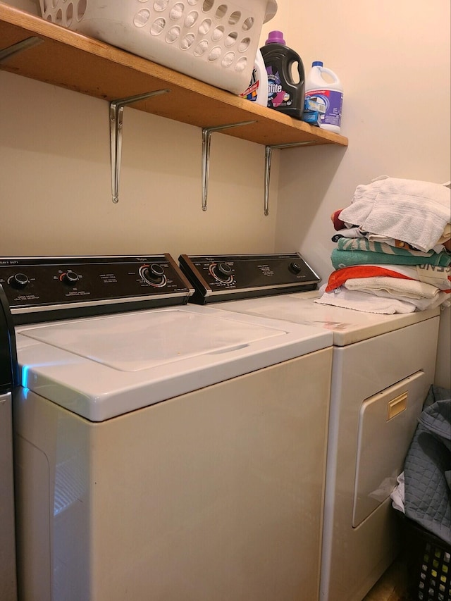 laundry room featuring washing machine and dryer