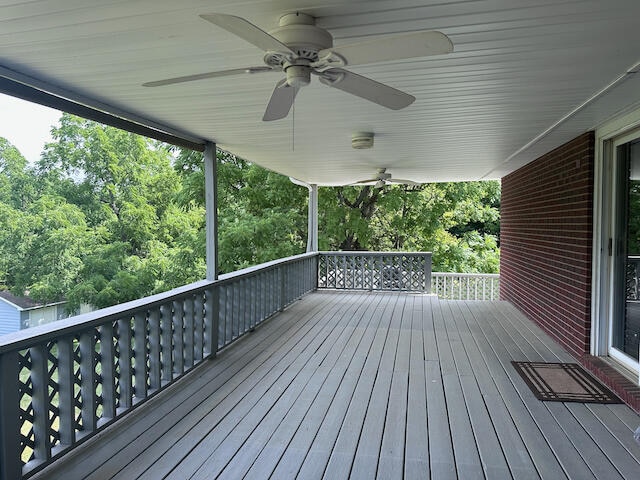 wooden deck with ceiling fan