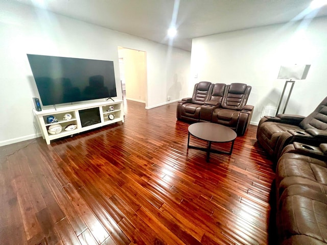 living room with dark hardwood / wood-style floors