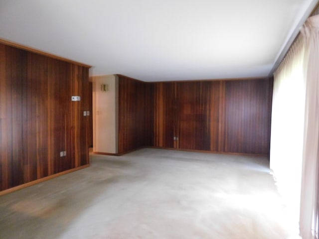 empty room with wood walls