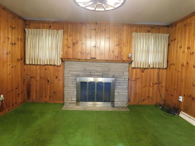 unfurnished living room with carpet floors, a fireplace, and wood walls