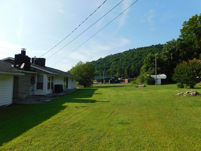 view of yard with cooling unit