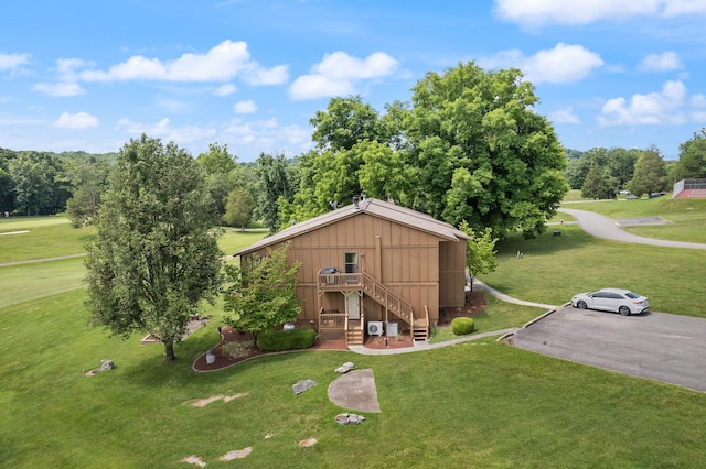 37-2 Woodson Bend Resort, Bronston, KY 42518 - exterior space with a wooden deck, board and batten siding, stairway, and a front yard