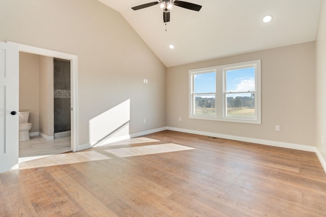 unfurnished room with lofted ceiling, light hardwood / wood-style flooring, and ceiling fan