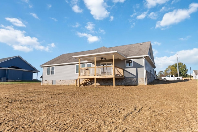 back of house featuring cooling unit, a deck, and ceiling fan