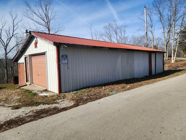 view of outdoor structure with a garage