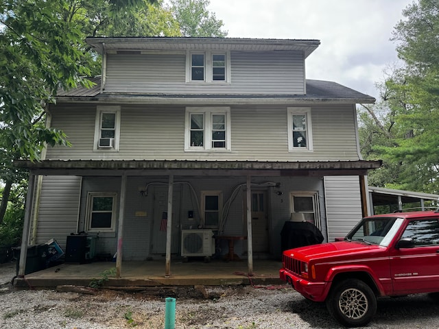 view of property with a porch