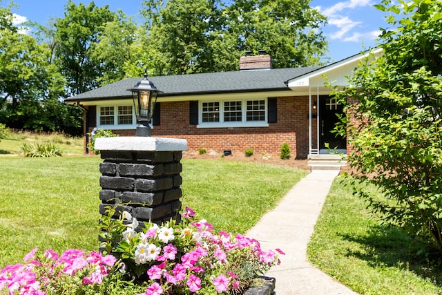 view of front of house with a front yard