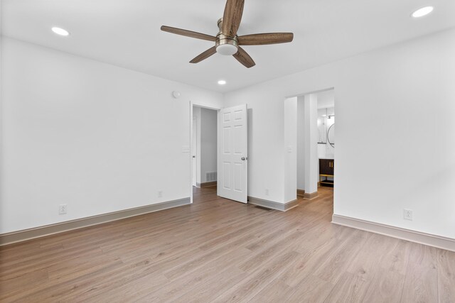 unfurnished bedroom featuring ceiling fan and light hardwood / wood-style floors