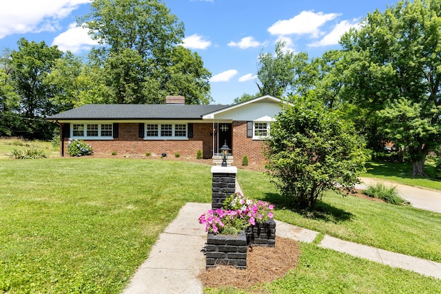 single story home featuring a front yard