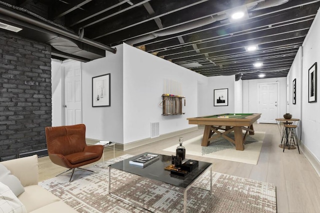 game room featuring light wood-type flooring and billiards