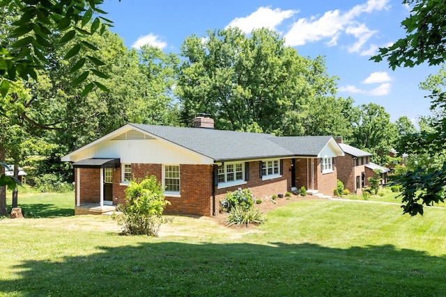 ranch-style house with a front yard