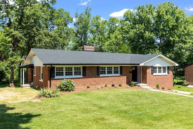 ranch-style home with a front yard